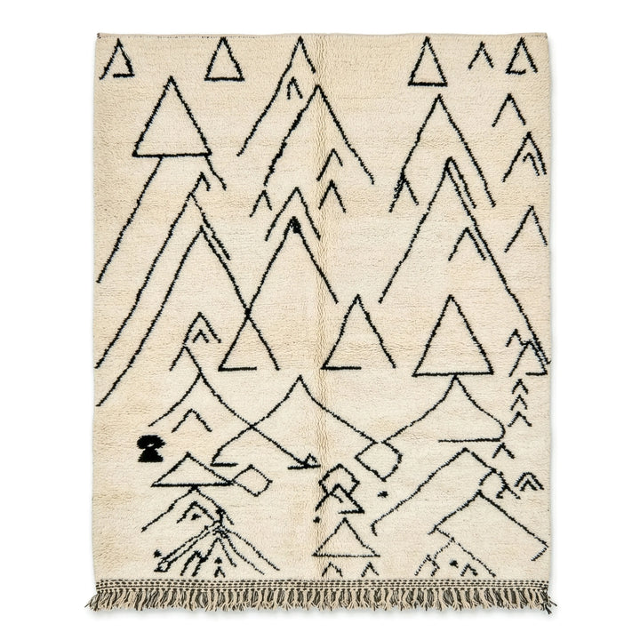 Beige rug with black geometric triangle pattern on a white background