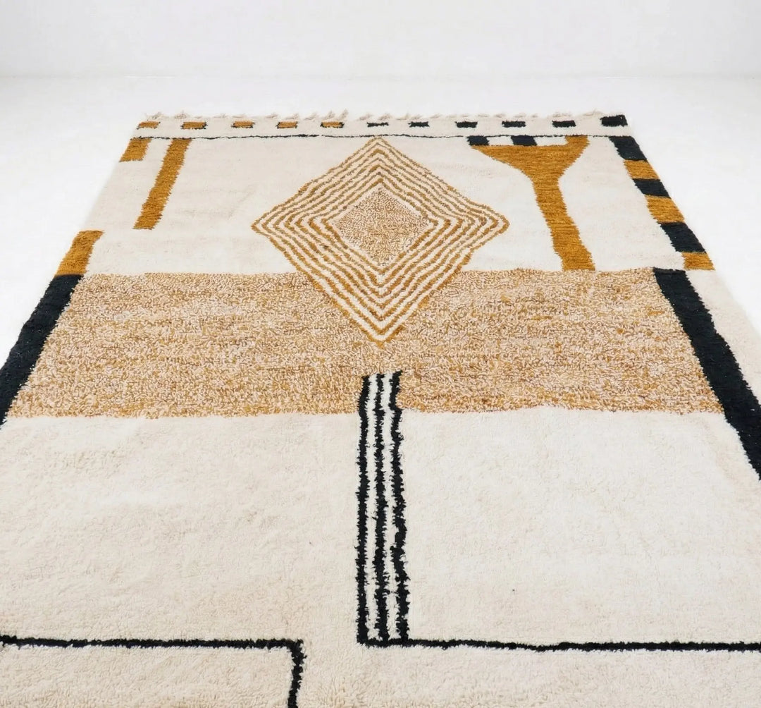Geometric patterned rug with brown, black, and white colors on a white background