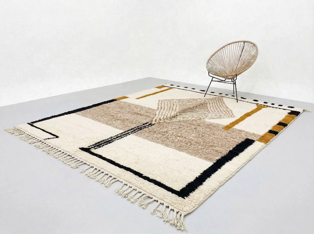 Geometric patterned rug with a chair on a white floor
