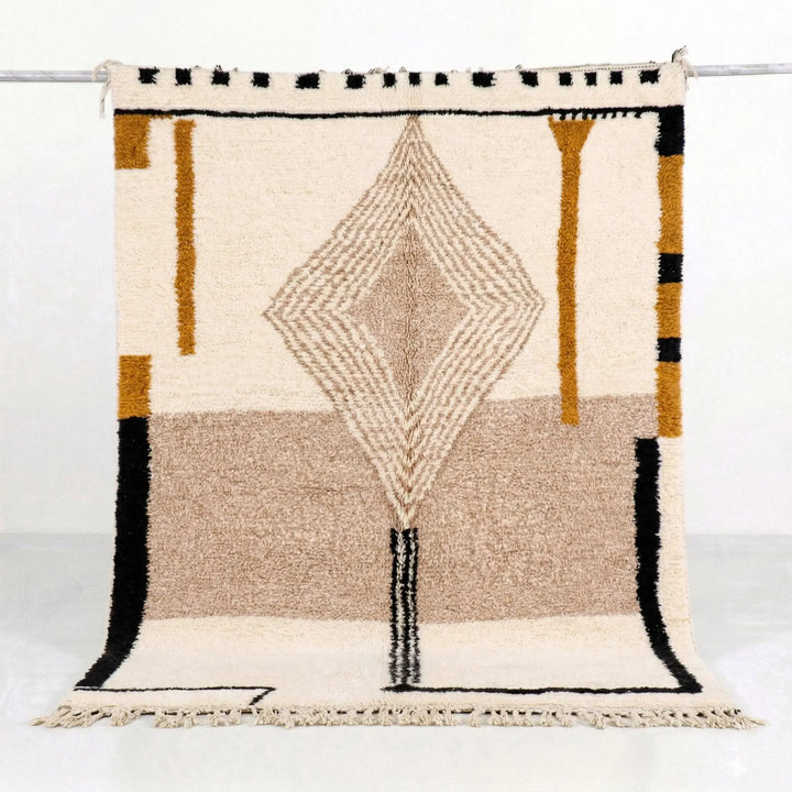 Woven blanket with geometric pattern on a white background