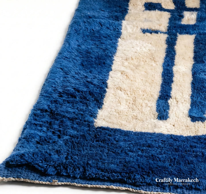 Luxury hand-knotted Moroccan rug with high pile. Premium Middle Atlas wool in deep Majorelle blue, featuring a unique abstract art design.