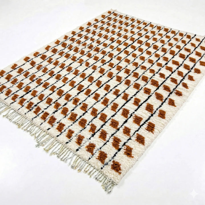 Woven rug with brown and beige pattern on a white background